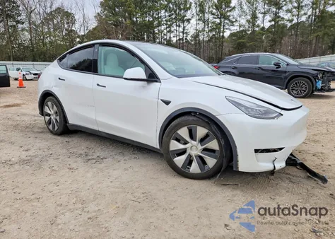 2023 Tesla Model Y из США, поврежденный, VIN 7SAYGDEE8PF610088